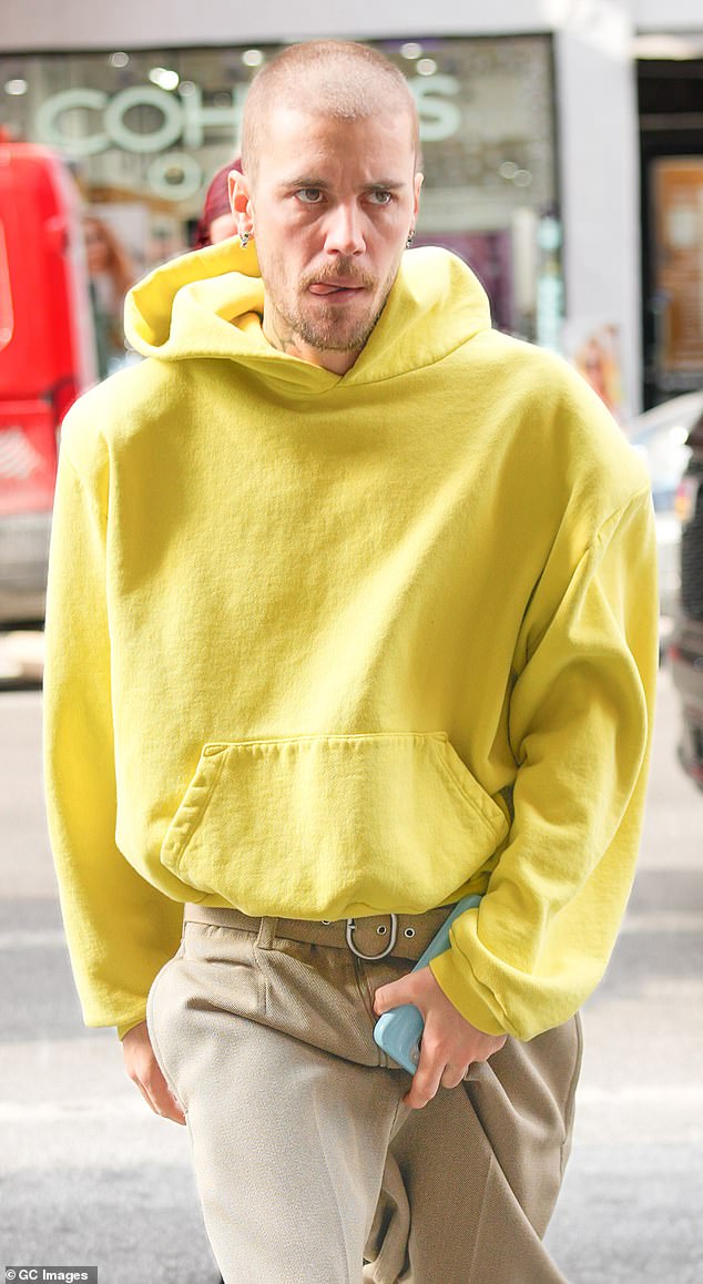 Experts tell DailyMail.com the most noticeable changes in Justin Bieber's look are his receding hairline, loss of volume in his face and development of wrinkles (pictured above in January 2025)